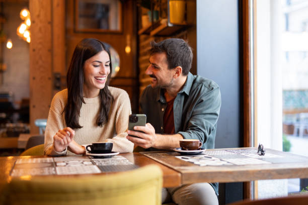 istock Couple enjoying coffee and social media 2181015132