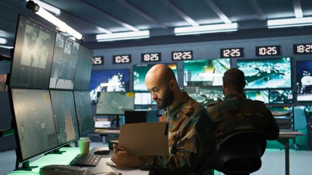 istock Soldier doing patriotic duty in military HQ base 2181020164