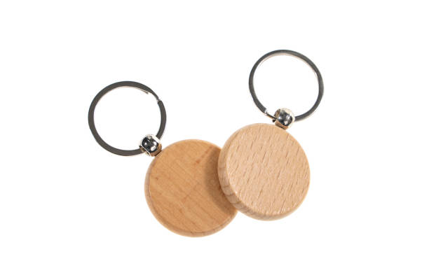 istock two Wooden key chains isolated on white 2181020297
