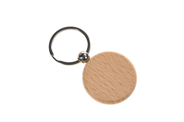 istock Wooden key chain isolated on white 2181020298