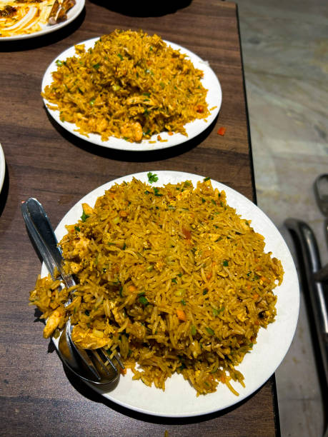 istock Mixed hot garlic fried rice in a white plate 2181020479