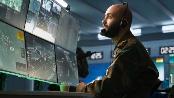 istock Army expert providing intel for troops, coordinating mission activities 2181023720