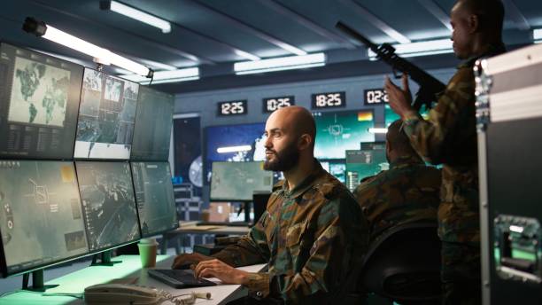 istock Portrait of military agent working in control room, analyzing aerial data 2181030938