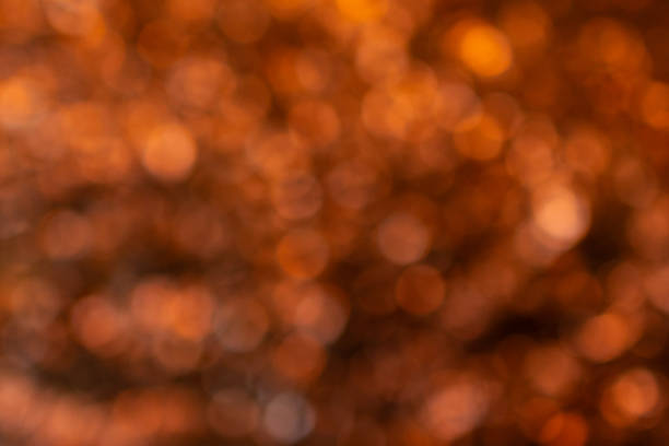 istock Abstract blurred orange background with bokeh effect. Festive background. Holidays. Blurred texture. Glitter. New Year. 2181032895