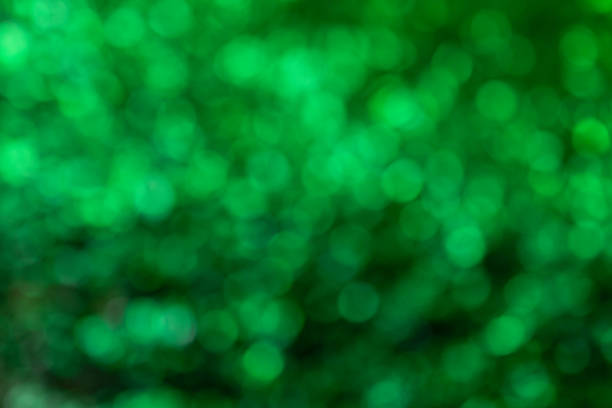 istock Blurred green background with bokeh effect. Festive background. Holidays 2181033103