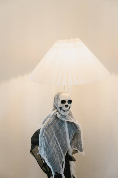 A creative lamp featuring a skeleton design, uniquely styled for a spooky ambiance.