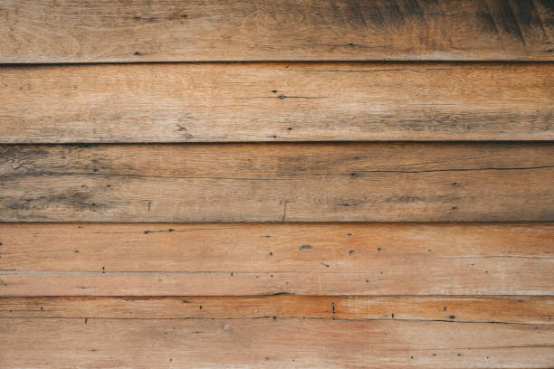 istock weathered wood siding painted white in the middle 2181039123