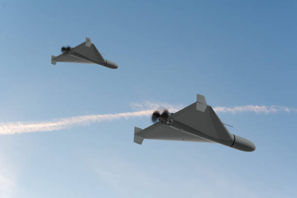 istock A group of military drones flying through the daytime against a clear blue sky 2181044946