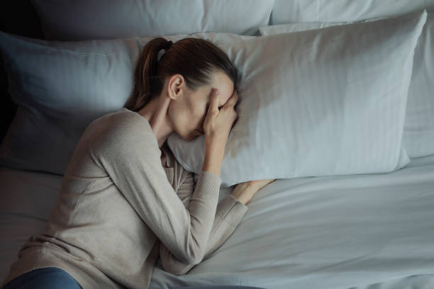 istock Woman feeling tired in the bed. Insomnia. 2181046436