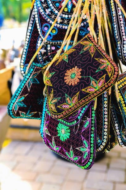 istock Vibrant embroidered Turkish bags on display, traditional patterns 2181048646