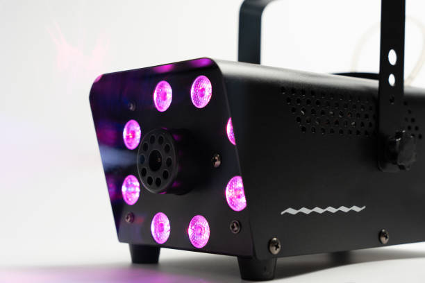 istock Black smoke machine with purple backlight and black frame. 2181048666