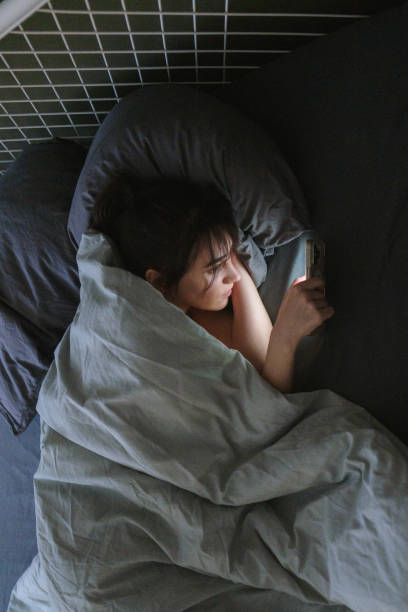 istock Late night scrolling through my phone 2181051879