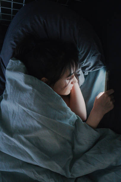 istock Late night scrolling through my phone 2181051897