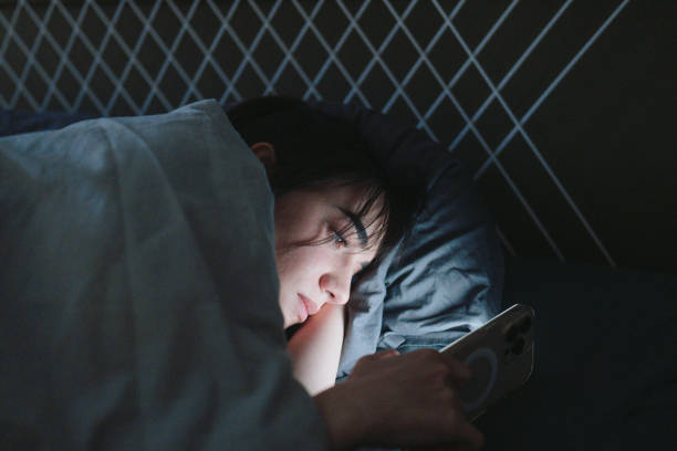istock Late night scrolling through my phone 2181051904