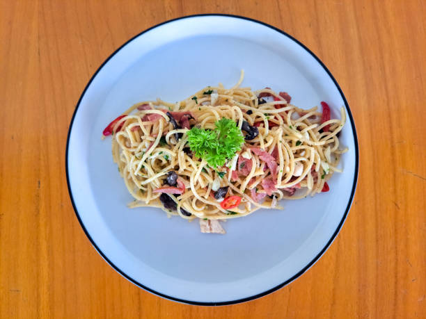 Delicious Spaghetti Aglio e Olio On A Plate. Food Menu. Top View.