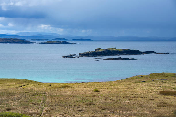 The beaches around Morar in the North West Highlands of Scotland are some of the most beautiful in the country.  There are multiple bays of white and silver sand.  The beaches are unspoiled, with clear water and views across to the islands of Eigg and Rum.