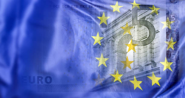 istock European Union Flag with Five Euro Banknote 2181067842