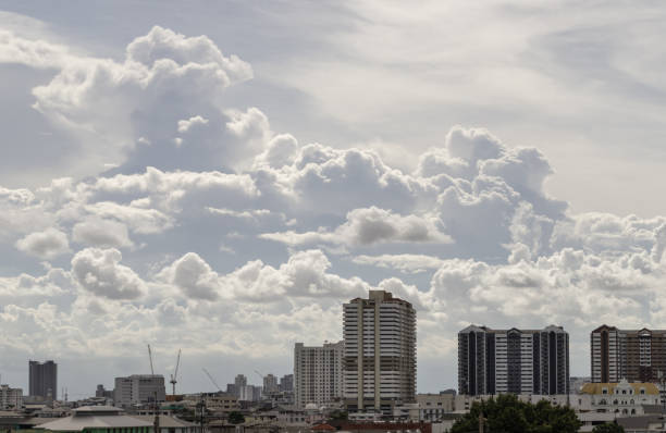 Bangkok, Thailand - 28 Aug 2024 - Amazing Clouds and Sky over Metropolitan City. Bangkok city skyscrapers at Afternoon with Dramatic sky background. use it as your wallpaper, poster and banner design, Selective focus.