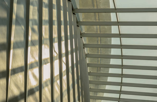 istock Modern architecture interior design of metal structure building with Burred light and shadow passing through glazed ceiling. 2181068416