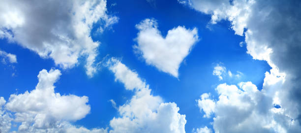istock Heart shaped cloud in beautiful sunny blue sky 2181068690
