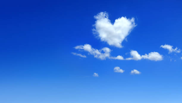 istock Heart shaped cloud in beautiful sunny blue sky 2181068692