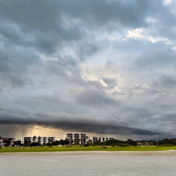 Waterfront buildings at Siesta Key beach in stormy day with dark clouds in Sarasota, Florida