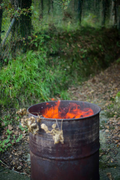 istock Fire on a barrel in a garden 2181070095