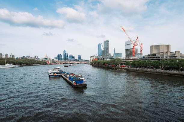 building structure and city life near Thames River, London, England