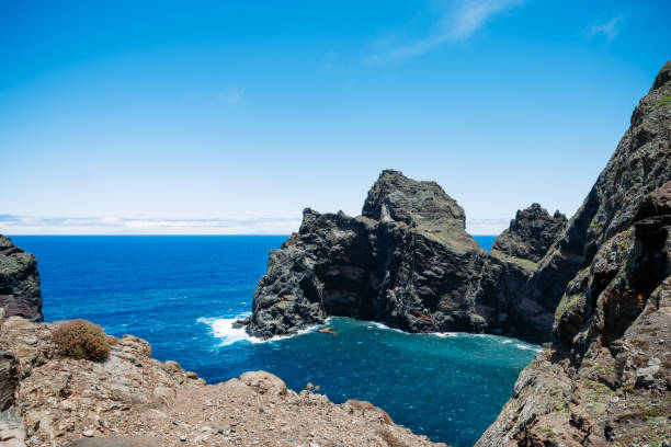 istock rock, cliff, waves, blue water of the Atlantic ocean 2181079055