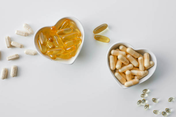 istock Tablets and vitamins on white background, banner advertising, pharmaceuticals 2181079914
