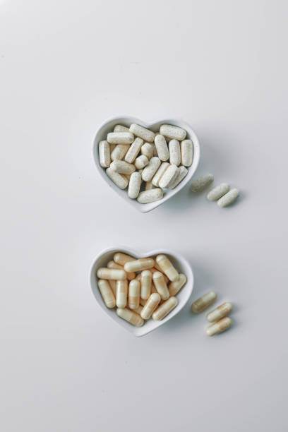 istock Tablets and vitamins on white background, banner advertising, pharmaceuticals 2181079927