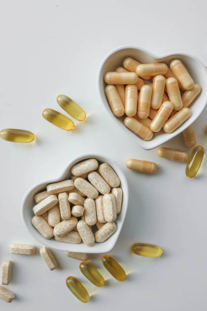 istock Tablets and vitamins on white background, banner advertising, pharmaceuticals 2181079929