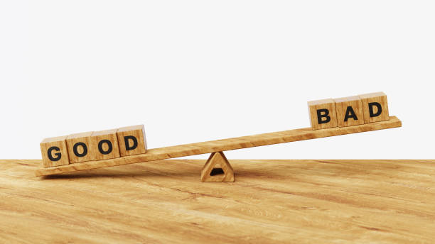 istock 3D bad over good on balance scales. Different choices, accept or decline, comparison or suggestion concept 2181079962