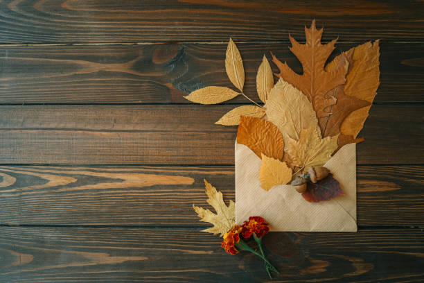 istock Envelope with autumn leaves, autumn mood 2181080359