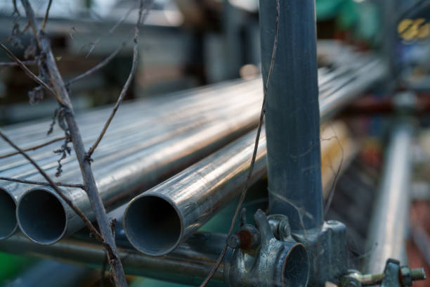 Lots of iron pipes lined up.