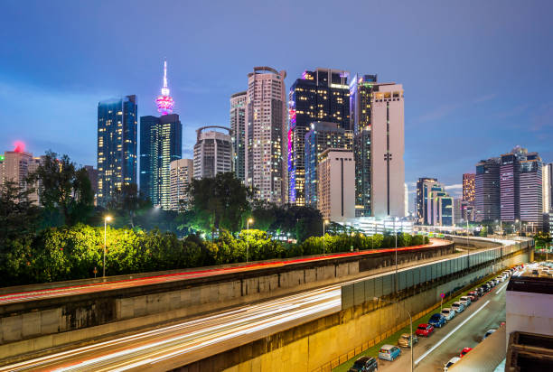 The capital of Malaysia, famous skyscrapers such as the Twin Towers (Menara Berkembar Petronas), nature, trees and big cities, saloma bridges, are popular with tourists. Malaysia, Asia.
