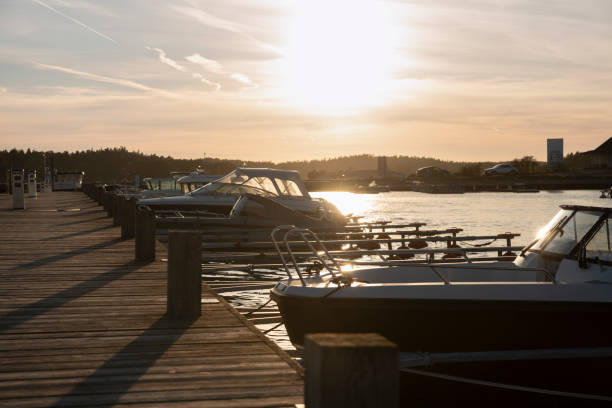 istock Boats at the pier with sun in a background 2181109896