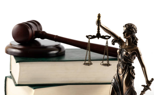 istock Themis figure, judge's gavel and book 2181110245