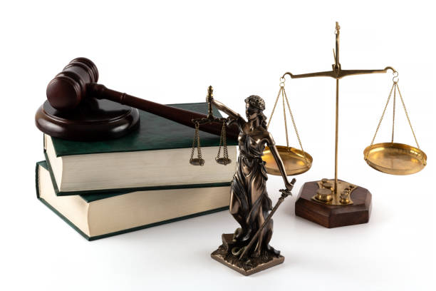 istock Themis figure, judge's gavel and book 2181110251