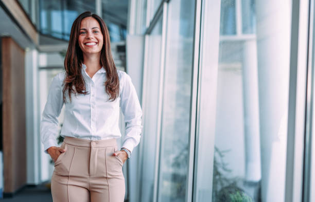 istock Confident businesswoman in modern office. 2181114489