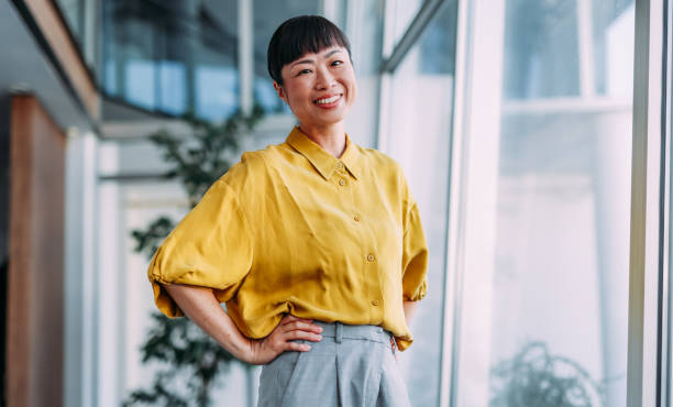 istock Confident businesswoman in modern office. 2181114491