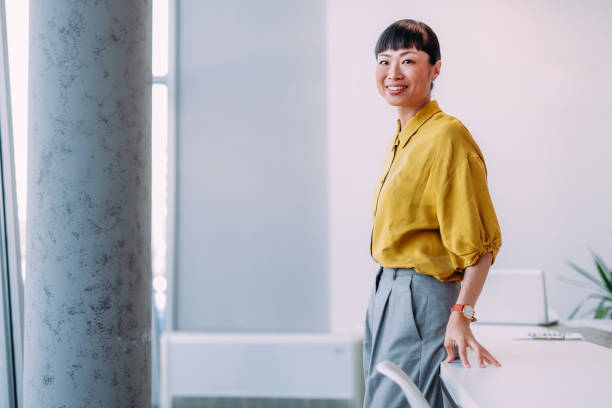 istock Confident businesswoman in modern office. 2181114492