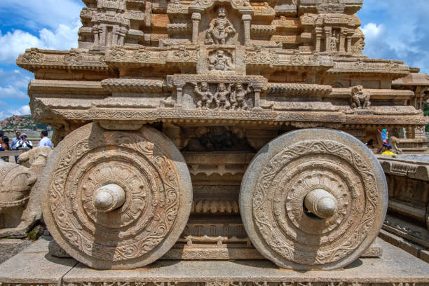 Hampi, India - October 14 2024: The Stone Chariot at Hampi India. Stone Chariot is an iconic monument located in front of Vijaya Vittala Temple in Hampi.