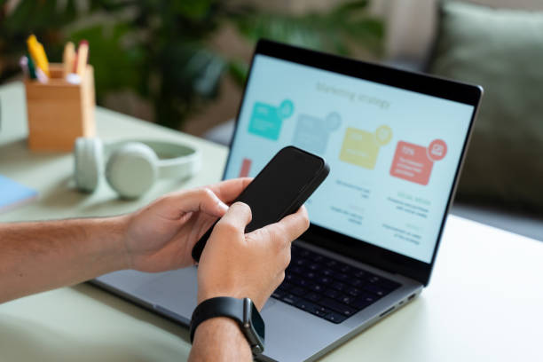 istock Marketing manager working on marketing strategy using laptop and smartphone 2181117932