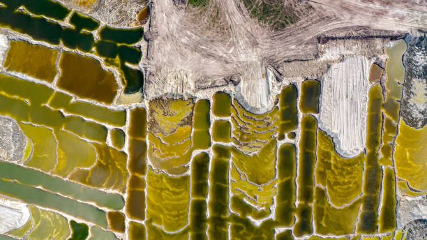 istock Aerial view of opencast surface sand mining, area with subterranean waters 2181119954