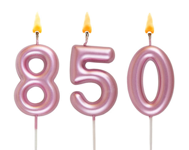 Pink birthday candles isolated on white background, number 850