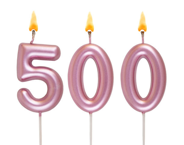 istock Pink birthday candles isolated on white background, number 500 2181122481