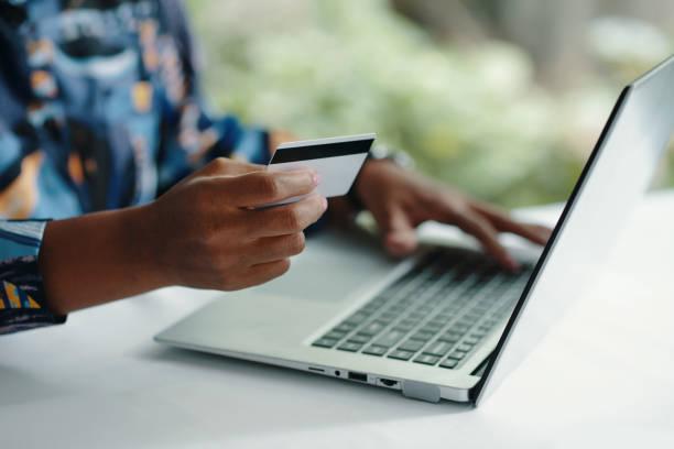 istock Woman Using Credit Card Online 2181125428