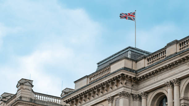 Cut out British flag waving in mid air.