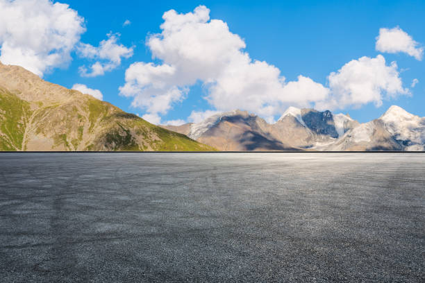 istock Asphalt road square and mountain with sky clouds natural landscape 2181131430